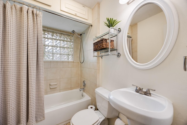 13835 Pyramid Dr, Farmers Branch, TX 75234 - bathroom featuring a sink and shower / bath combo