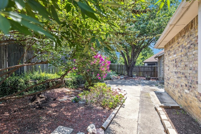 5219 Tennis Villa Dr, Arlington, TX 76017 - fenced backyard with a patio