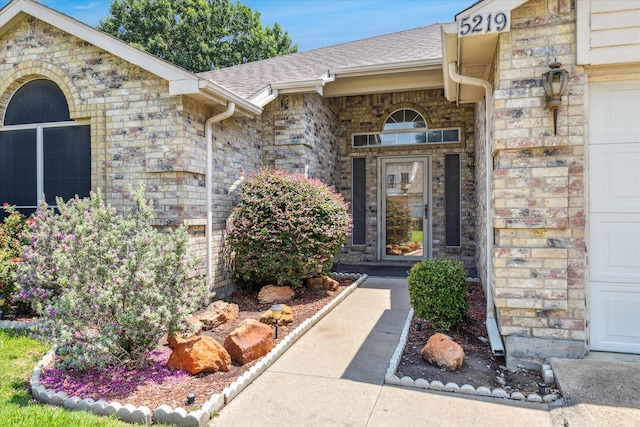 5219 Tennis Villa Dr, Arlington, TX 76017 - doorway to property featuring roof with shingles