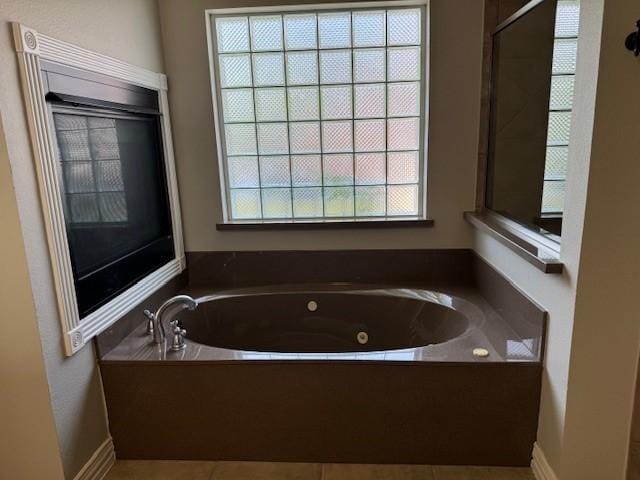 3840 W Pioneer Dr, Irving, TX 75061 - full bathroom with a whirlpool tub