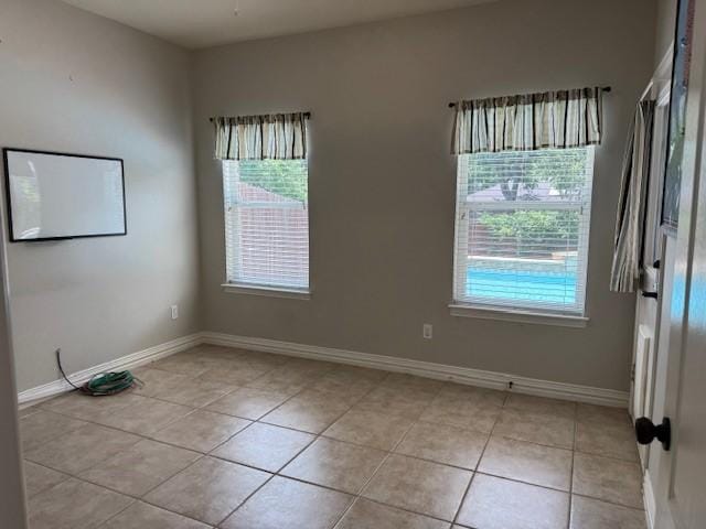 3840 W Pioneer Dr, Irving, TX 75061 - unfurnished room with light tile patterned floors