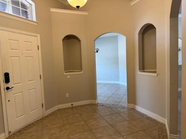 3840 W Pioneer Dr, Irving, TX 75061 - tiled foyer featuring a high ceiling and arched walkways