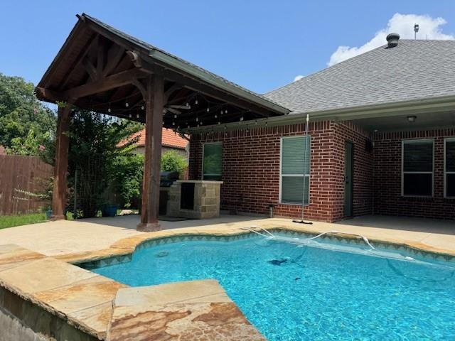 3840 W Pioneer Dr, Irving, TX 75061 - view of pool featuring a patio