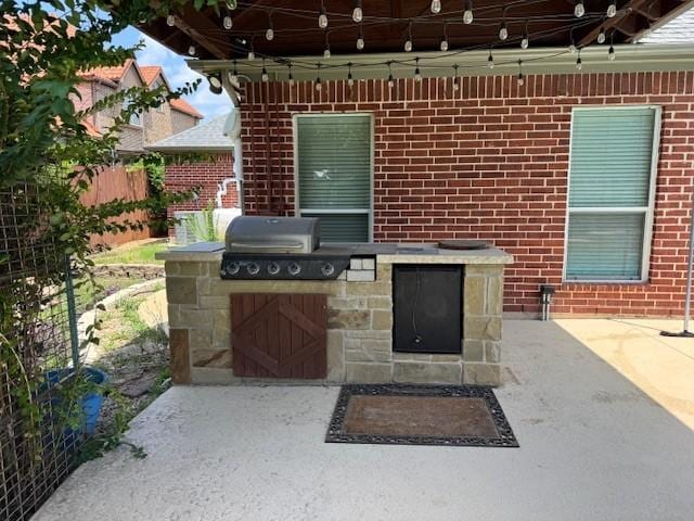 3840 W Pioneer Dr, Irving, TX 75061 - view of patio featuring area for grilling