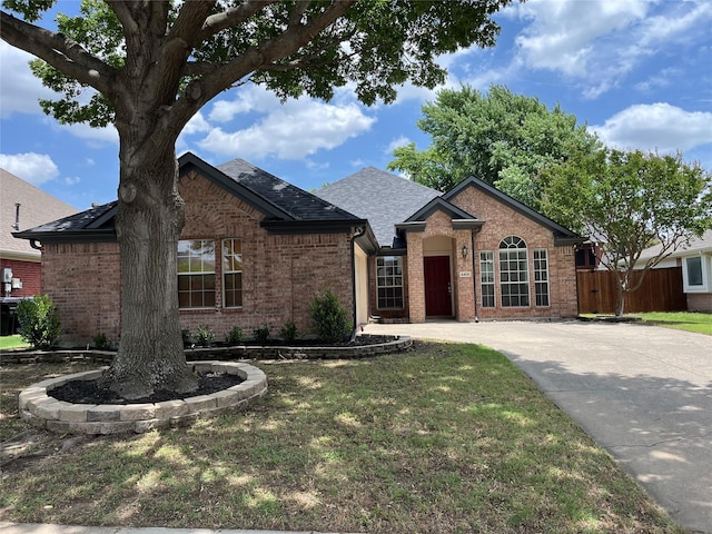 4400 Ripplewood Rd, Frisco, TX 75035 - single story home with brick siding, roof with shingles, and driveway