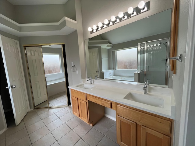 4400 Ripplewood Rd, Frisco, TX 75035 - bathroom with a garden tub, double vanity, tile patterned floors, and a stall shower