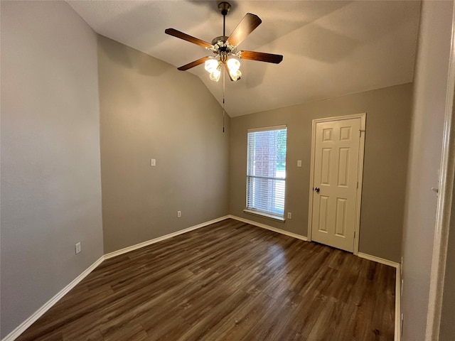 4400 Ripplewood Rd, Frisco, TX 75035 - unfurnished room with dark wood-style flooring, lofted ceiling, and a ceiling fan