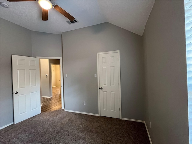 4400 Ripplewood Rd, Frisco, TX 75035 - unfurnished bedroom with lofted ceiling, carpet floors, and a ceiling fan