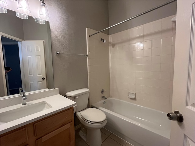 4400 Ripplewood Rd, Frisco, TX 75035 - full bath featuring vanity, tub / shower combination, a textured wall, and tile patterned flooring