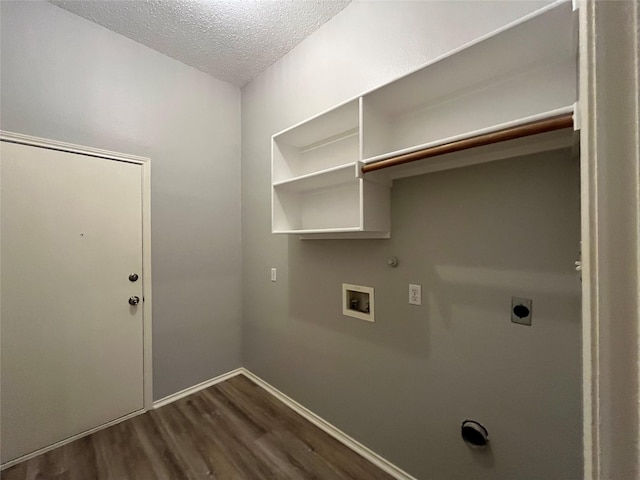 4400 Ripplewood Rd, Frisco, TX 75035 - laundry area with electric dryer hookup, dark wood finished floors, a textured ceiling, hookup for a gas dryer, and washer hookup