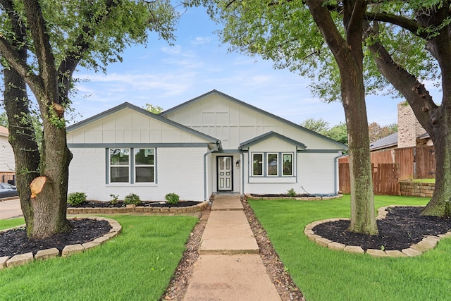 2024 Oakmeadow St, Bedford, TX 76021 - ranch-style house with board and batten siding and brick siding
