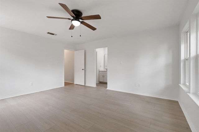 2024 Oakmeadow St, Bedford, TX 76021 - empty room with ceiling fan and light wood-type flooring