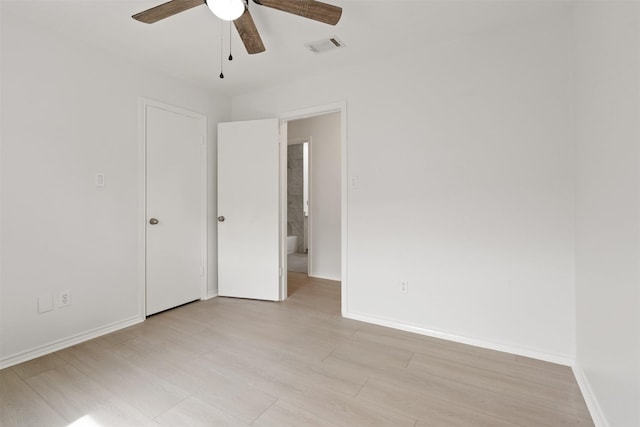 2024 Oakmeadow St, Bedford, TX 76021 - unfurnished bedroom with light wood finished floors and a ceiling fan