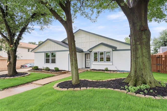 2024 Oakmeadow St, Bedford, TX 76021 - view of front of house featuring board and batten siding and brick siding