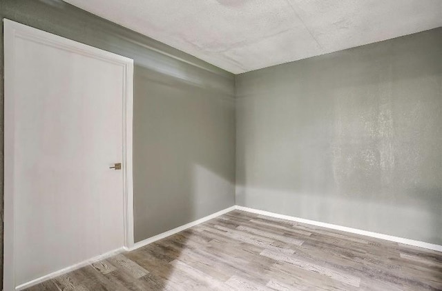 3501 NE 10th St, Mineral Wells, TX 76067 - unfurnished room featuring wood finished floors and baseboards