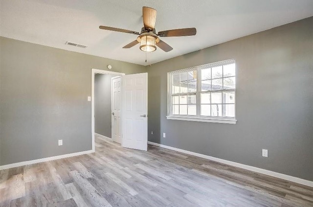 3501 NE 10th St, Mineral Wells, TX 76067 - unfurnished room with a ceiling fan and wood finished floors