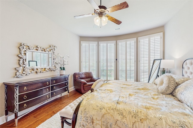 5768 Gallant Run, Frisco, TX 75033 - bedroom with wood finished floors and a ceiling fan