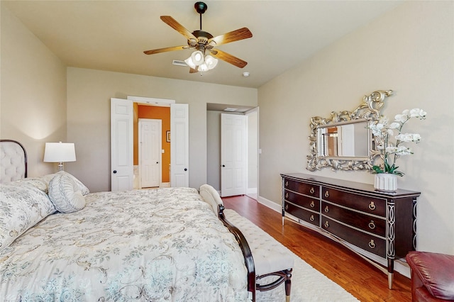 5768 Gallant Run, Frisco, TX 75033 - bedroom featuring wood finished floors and a ceiling fan