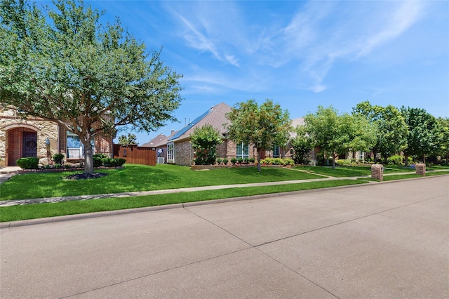 5768 Gallant Run, Frisco, TX 75033 - view of front of house with a front yard and brick siding