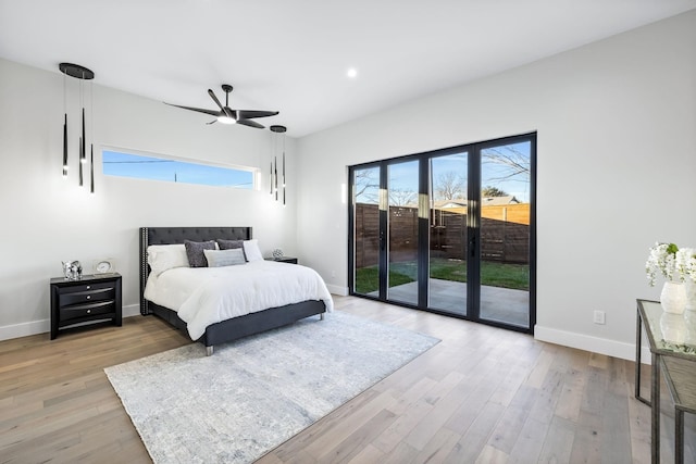 4603 Newmore Ave, Dallas, TX 75209 - bedroom featuring access to outside, wood finished floors, and ceiling fan