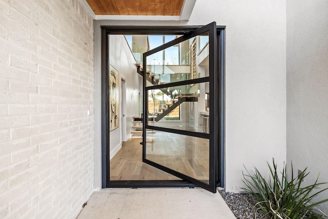 4603 Newmore Ave, Dallas, TX 75209 - doorway to property featuring stucco siding
