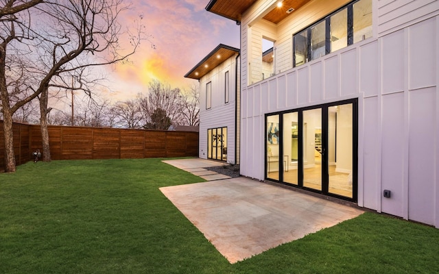 4603 Newmore Ave, Dallas, TX 75209 - fenced backyard with a patio