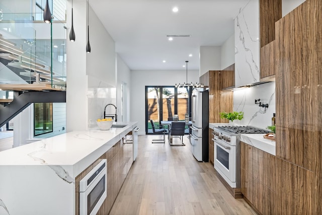 4603 Newmore Ave, Dallas, TX 75209 - kitchen featuring modern cabinets, white appliances, brown cabinetry, light wood finished floors, and light stone counters