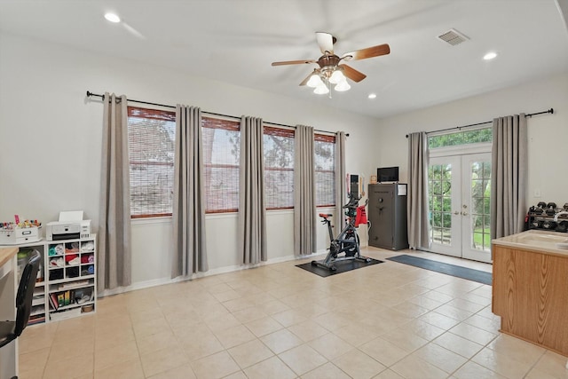 1128 Bent Oaks Dr, Denton, TX 76210 - exercise room with a ceiling fan, french doors, recessed lighting, and light tile patterned floors