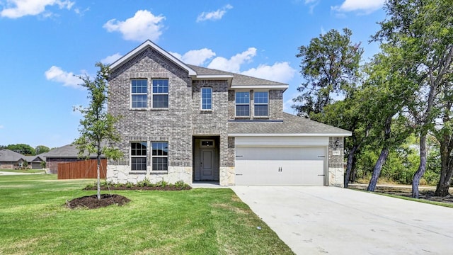 414 Drake Dr, Ferris, TX 75125 - view of front of house with stone siding, concrete driveway, and roof with shingles