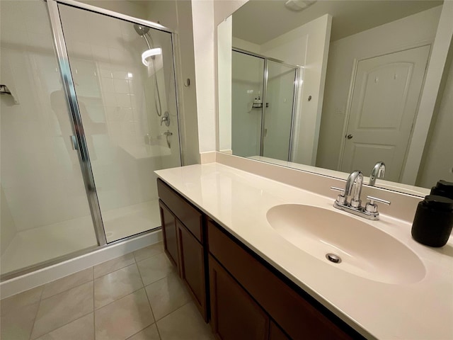 1092 Decker Dr, Fate, TX 75189 - full bathroom with a shower stall, vanity, and tile patterned floors