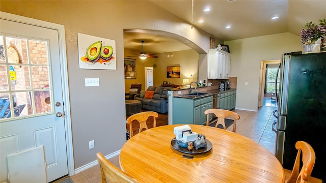 8901 Arbor Crest Ct, Fort Worth, TX 76179 - dining room featuring light tile patterned floors, ceiling fan, lofted ceiling, recessed lighting, and arched walkways