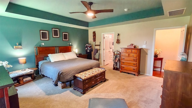 8901 Arbor Crest Ct, Fort Worth, TX 76179 - carpeted bedroom featuring a tray ceiling and a ceiling fan