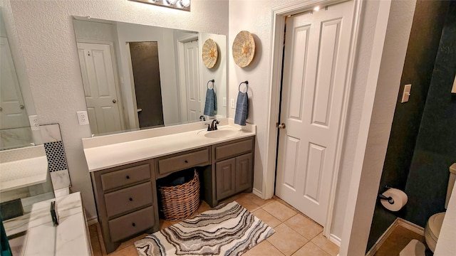8901 Arbor Crest Ct, Fort Worth, TX 76179 - bathroom featuring vanity, tile patterned flooring, and a textured wall