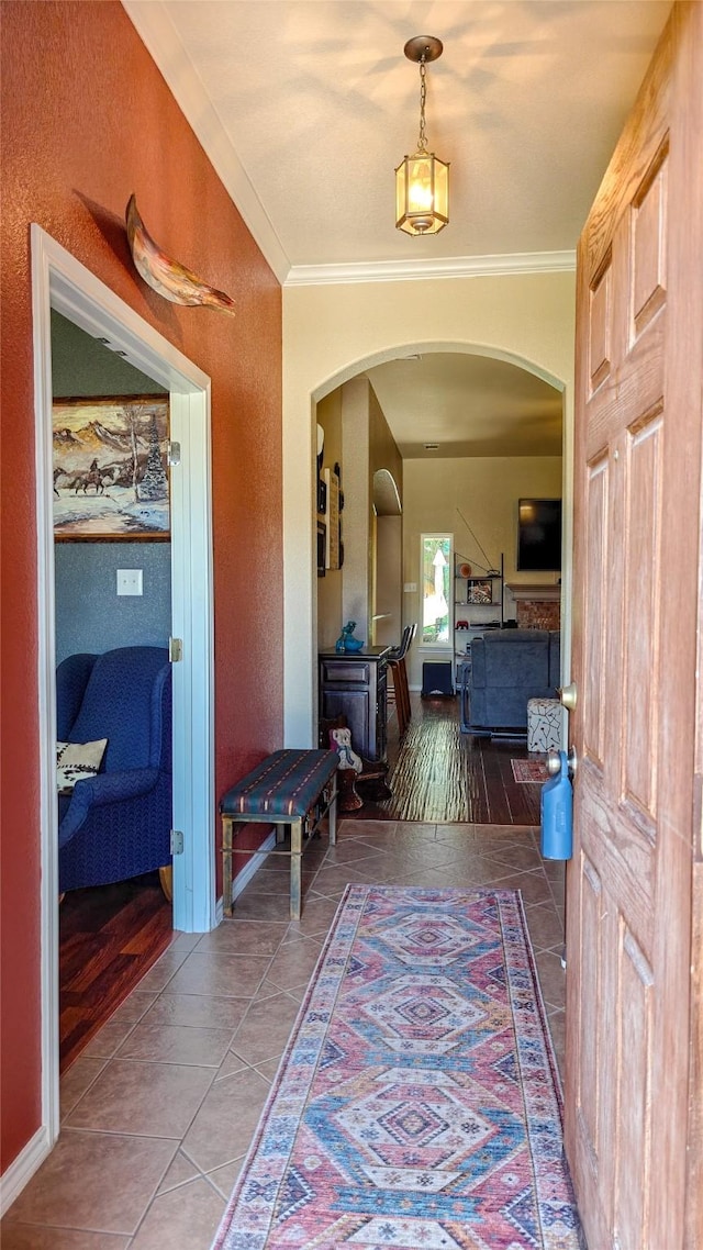 8901 Arbor Crest Ct, Fort Worth, TX 76179 - hallway with arched walkways, ornamental molding, and tile patterned floors