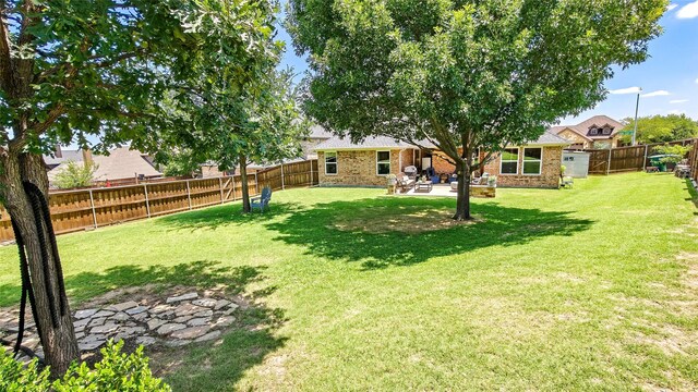 8901 Arbor Crest Ct, Fort Worth, TX 76179 - fenced backyard with a patio area