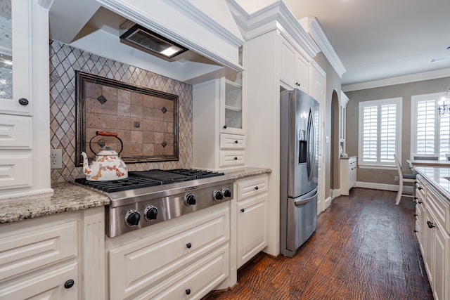 126 Yorkshire Dr, Heath, TX 75032 - kitchen featuring stainless steel appliances, dark wood-style floors, ornamental molding, glass insert cabinets, and white cabinets