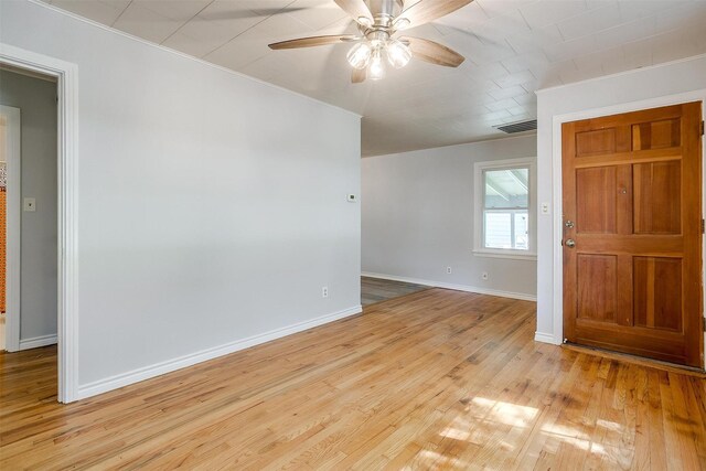 4944 Royal Dr, Fort Worth, TX 76116 - empty room featuring ceiling fan, wood finished floors, and crown molding