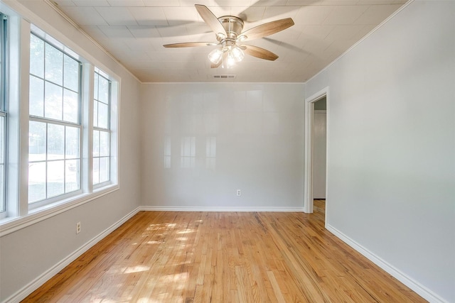 4944 Royal Dr, Fort Worth, TX 76116 - unfurnished room featuring light wood-style floors, crown molding, and ceiling fan