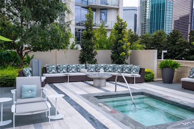 1918 Olive St Unit 502, Dallas, TX 75201 - view of pool featuring a hot tub and an outdoor hangout area