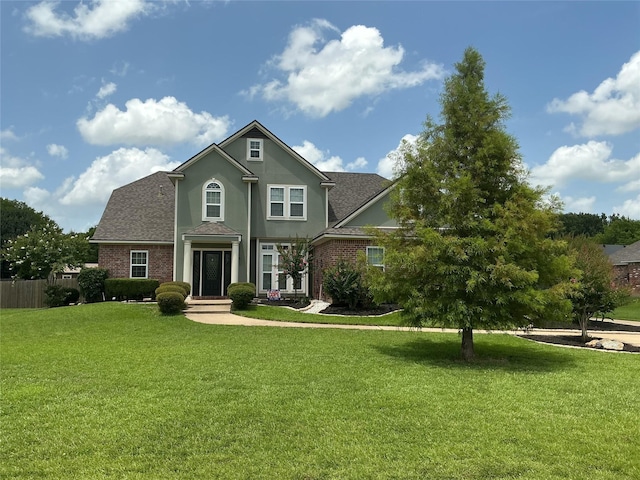 507 Weavers Way, Bossier City, LA 71111 - traditional home with a shingled roof, stucco siding, and brick siding