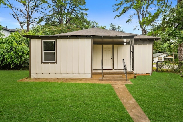 3920 Jamaica St, Dallas, TX 75210 - view of front of property with board and batten siding and roof with shingles