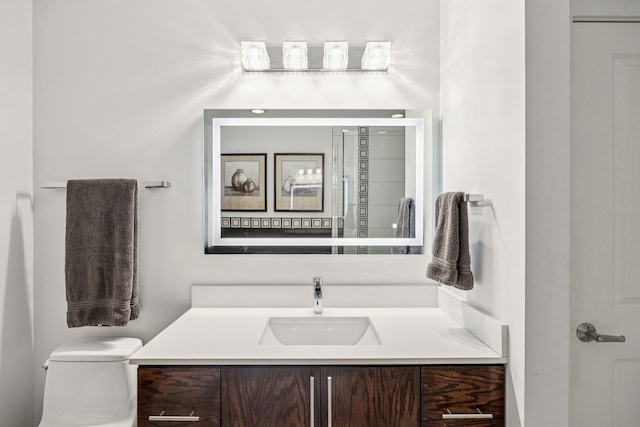 1200 Main St Unit 1106, Dallas, TX 75202 - bathroom featuring vanity and toilet