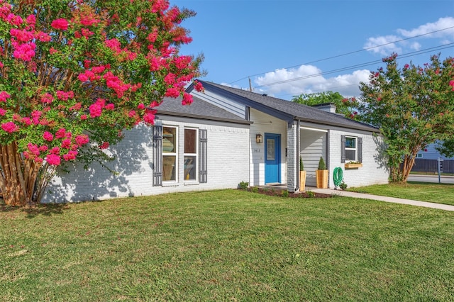 1413 White Way, Mckinney, TX 75069 - ranch-style home featuring brick siding, a front yard, and a chimney