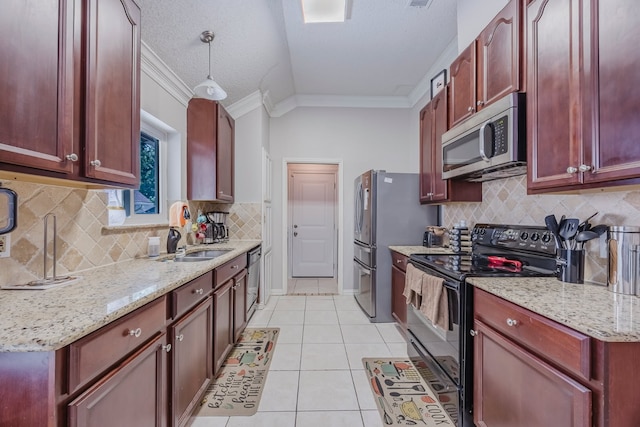 6508 Running Creek Dr, Arlington, TX 76001 - kitchen with stainless steel appliances, dark brown cabinets, crown molding, light tile patterned floors, and light stone counters