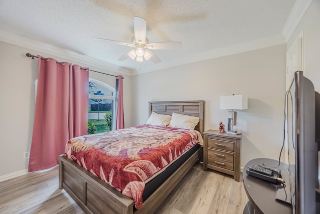6508 Running Creek Dr, Arlington, TX 76001 - bedroom featuring ornamental molding, a textured ceiling, light wood-style floors, and ceiling fan