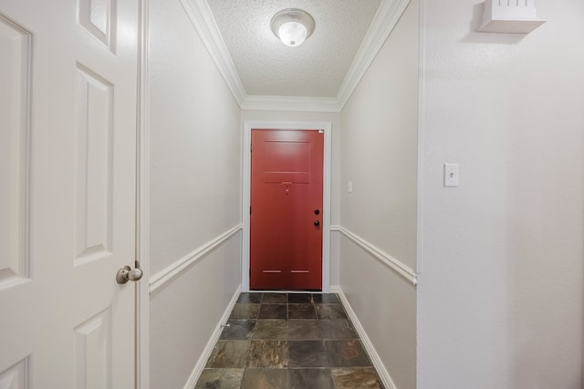 6508 Running Creek Dr, Arlington, TX 76001 - entryway featuring a textured ceiling, stone finish flooring, and crown molding