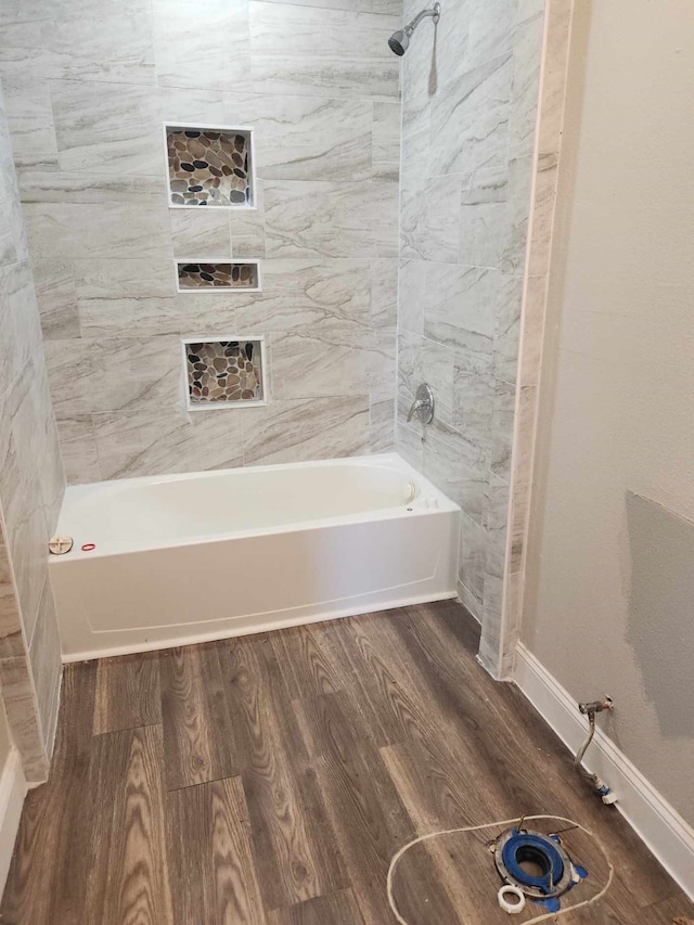 104 College St, Royse City, TX 75189 - full bathroom featuring wood finished floors and tub / shower combination