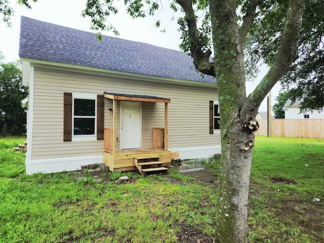 104 College St, Royse City, TX 75189 - rear view of property with a shingled roof