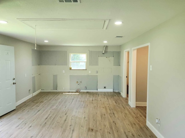 104 College St, Royse City, TX 75189 - unfurnished room featuring attic access, light wood finished floors, and recessed lighting