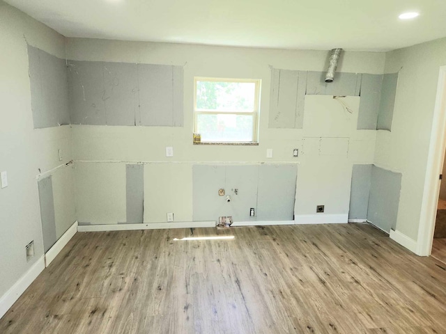 104 College St, Royse City, TX 75189 - washroom with wood finished floors and recessed lighting